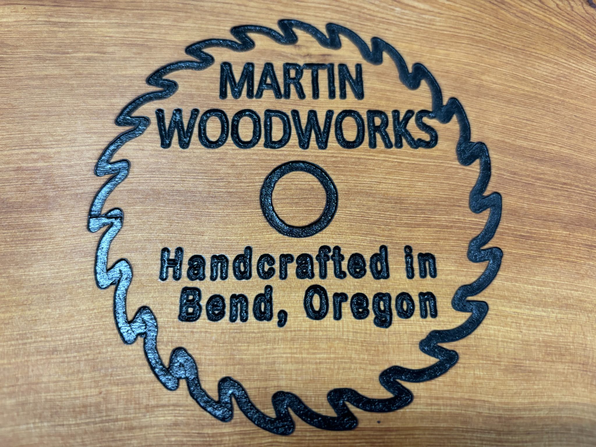 Martin Woodworks logo engraved on wood, handcrafted in Bend Oregon